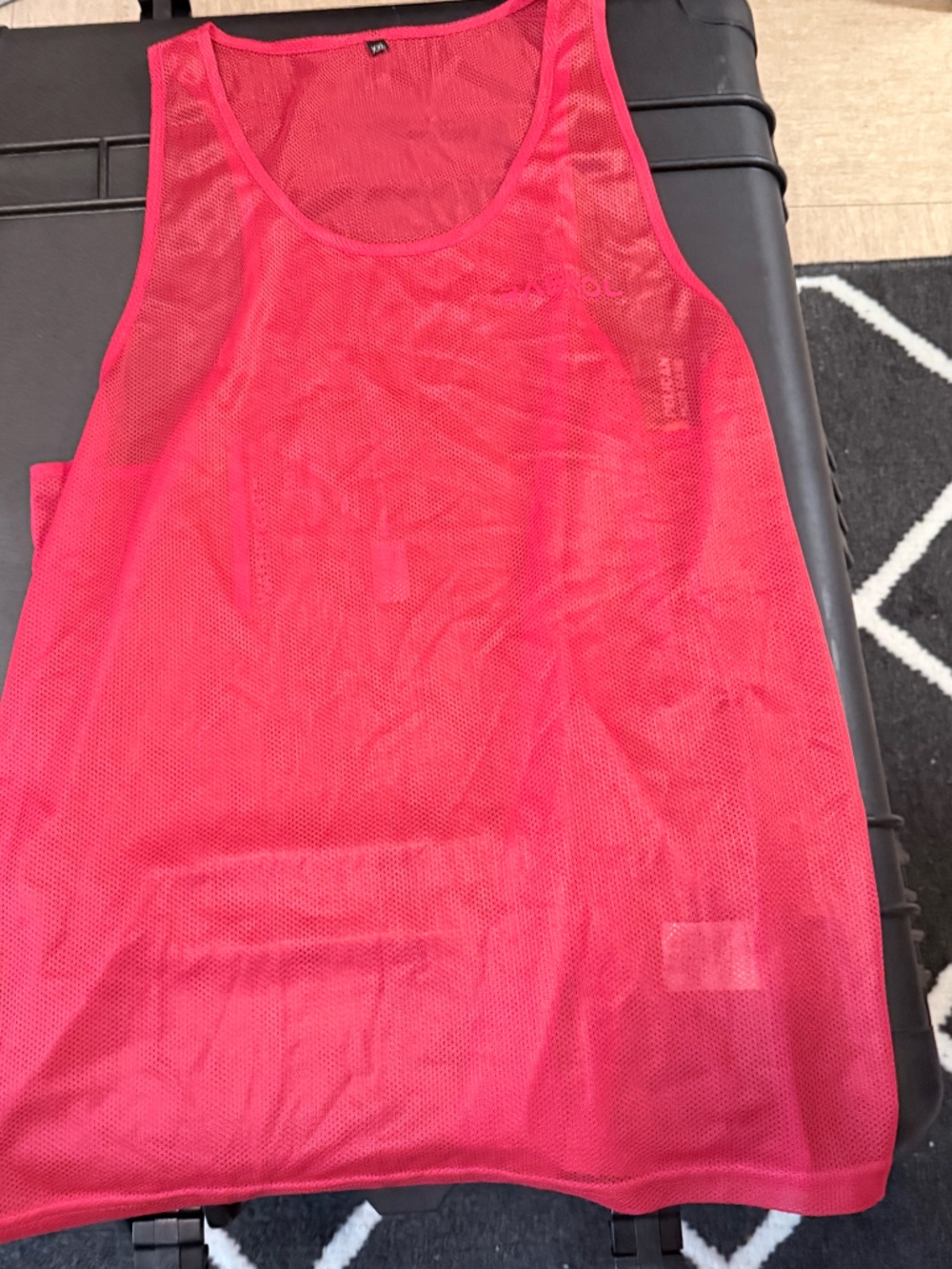 Red mesh tank top from RASKOL Apparel.